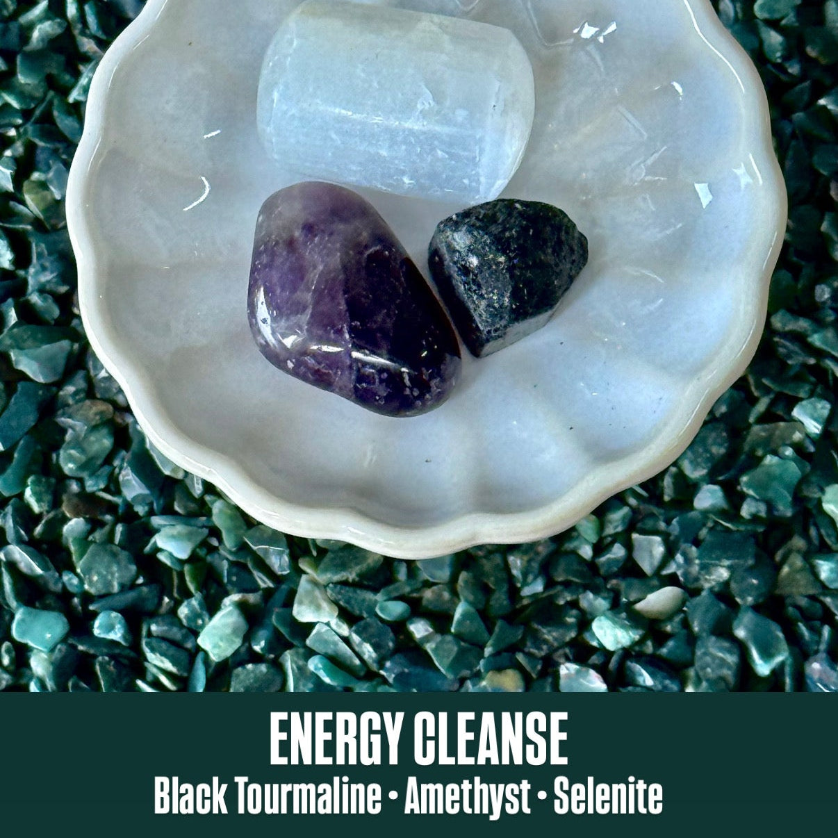 Shell with crystals on a dark green stone background, labeled 'Energy Cleanse'.