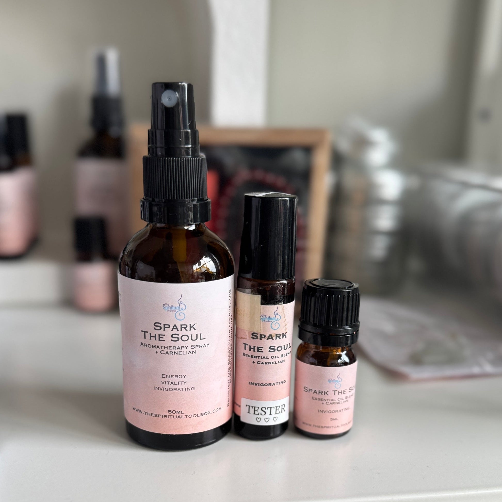 Bottles of 'Spark the Soul' products on a shelf with a blurred background